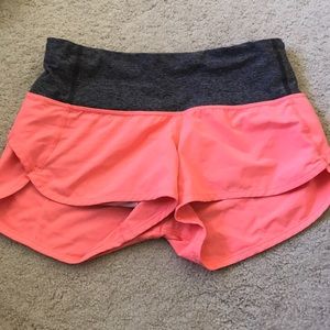 Salmon colored Lululemon speed up shorts